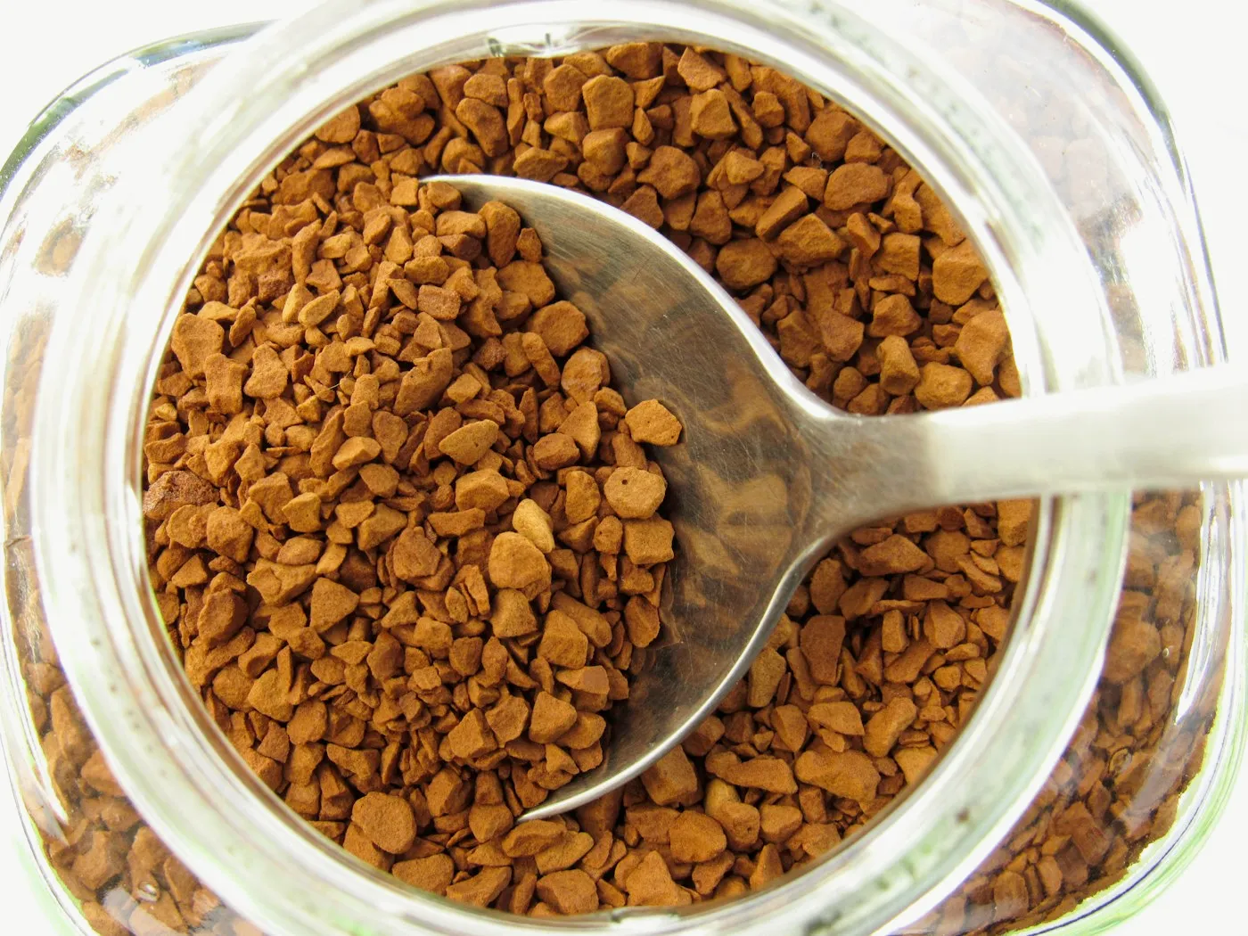 Instant coffee granules with a spoon